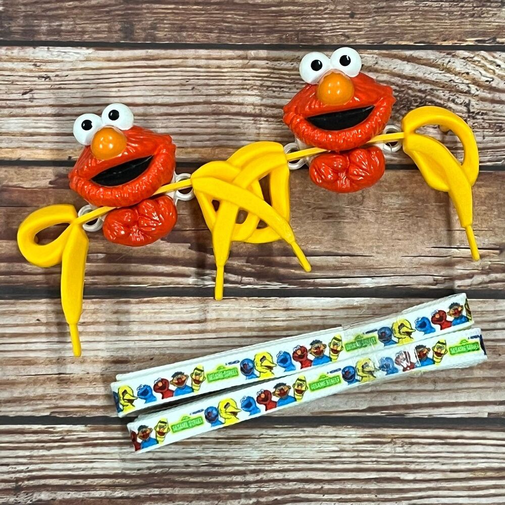 ((SOLD VIA CROSSPOST))
Vintage Elmo Sesame Street Bow Biters plus Laces